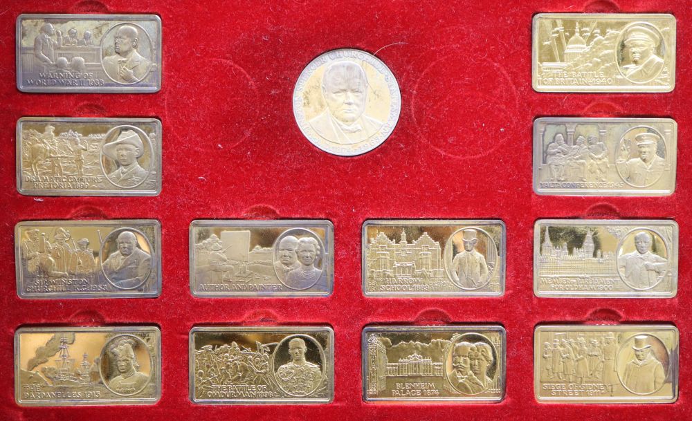 A cased set of twelve silver gilt The Churchill Years ingots and a similar medallion, gross 21.5oz.